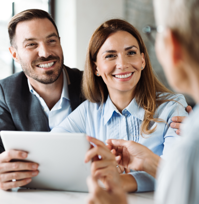 Happy couple Buying Real Estate with an IRA Mortgage